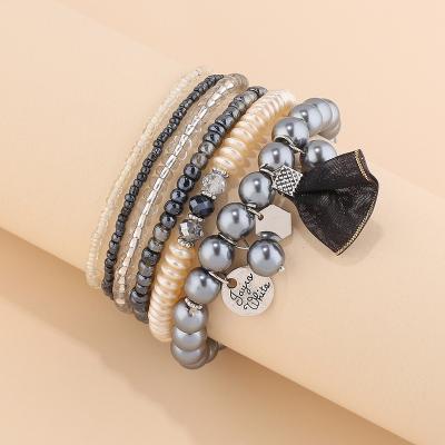 China High Quality Wholesale 6 Weave Pull Out Bead Bracelets Stacked Charm Bulk Bead Bracelets Women Custom Made for sale