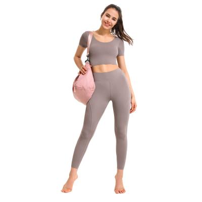 China Breathable Wholesale Sports Clothing Set Breathable Women Workout Clothing Yoga Bra Vest Sports Gaiters Women Set gymnasium for sale