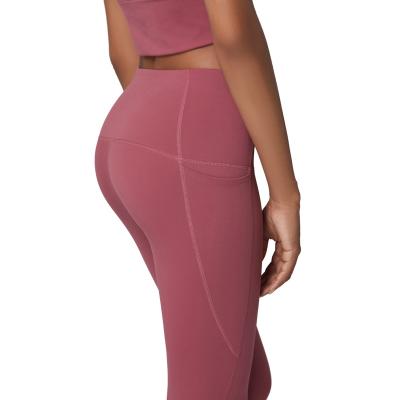 China Breathable American European Sexy Yoga Pants Peach Waist High Hip Lift Up Fitness Running Pants High Elastic Sports Tights For Women for sale