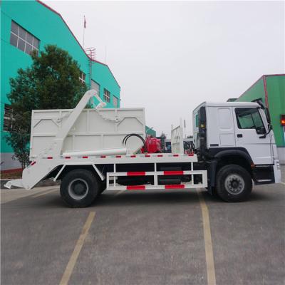 China Building material shops good quality howo 4x2 hydraulic swing arm roll garbage truck 10cbm skip loader garbage truck price for sale