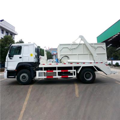 China Building Material Shops New Style 4x2 HOWO 8CBM 10CBM Skip Loader Garbage Truck Matched With Multiple Bins for sale