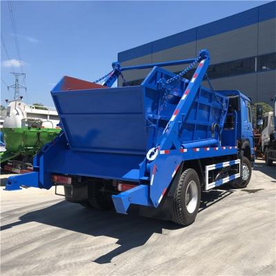 China Construction material stores SINOTRUK HOWO 4x2 10cbm waste collection arm roll container garbage truck for sale in Nigeria for sale