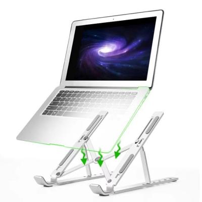 China (Size) Amazon Adjustable Foldable Portable Laptop Stand Hot Selling Ergonomic Plastic Laptop Stand for sale