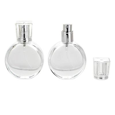 China Personal Care 25ml Round Transparent Glass Perfume Lotion Toner Cosmetic Packet Glass Convenient Spray Bottle for sale