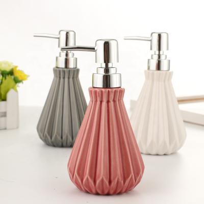 China Viable Macaron Color Cone Shell Shape With Straight Line Ceramic Lotion Bottle For Hotel Home Hand Wash Shampoo Sanitizer Bottle for sale