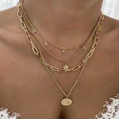 China FASHIONABLE European and American hot selling gold plated necklace 3 layers round pendant necklace posed rhinestone beauty head necklace for sale