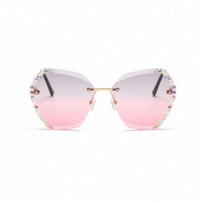 China Metal Sunglasses 2022 New Trend Bling Vintage Sunglasses Diamond Rimless Shade Metal Sun Personal Glasses For Women for sale