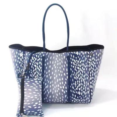 China Dive Material Perforated Waterproof Bag Fashion Beach Portable Casual Handbag Custom Large Bag Border Bag For Women for sale