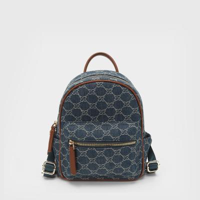 China 2021 wholesale China new large capacity anti-theft type double plaid simple shoulder backpack PU waterproof student b for sale