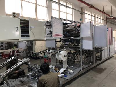 China Disposable Face Mask Making Machine With Height Level Adjusting Device At Bottom for sale