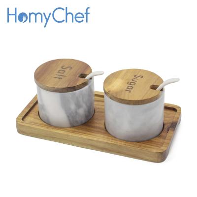 China Kitchenware Home Use Natual Marble Salt and Pepper Salt Shakers with Acacia Wood Base with Ceramic Spoons for sale