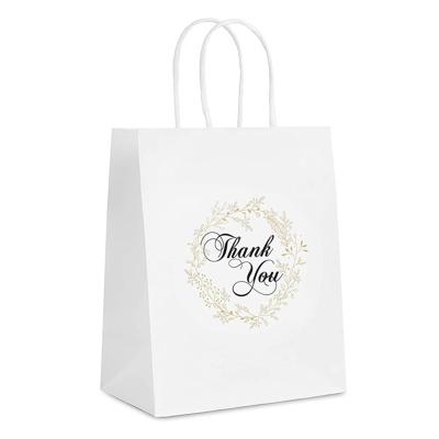 China Custom Recyclable Brown Kraft Paper Bags Wholesale Shopping Packing Kraft Bag With Handle for sale