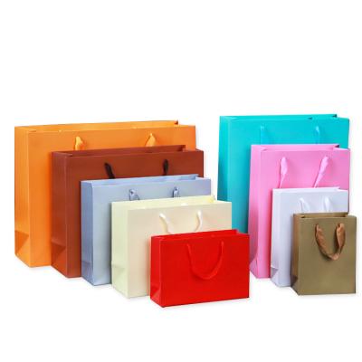 China Recyclable Gift Paper Bags With Ribbon Shopper Paper Bag Shopping for sale