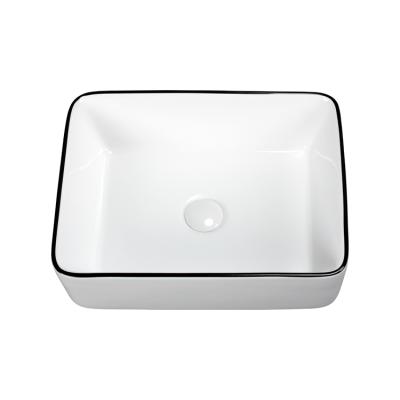 China Modern Hot Sale Ceramic Sink White Color With Black Line Hotel Special Design Wash Art Basin for sale