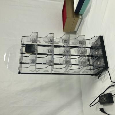 China OEM Durable Rotating Iron Jewelry Rack Floor Metal Wire Earing Display Stand for sale