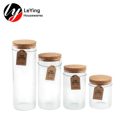 China Freshness Preservation Kitchen Jam Decor 4Pcs High Borosilicate Cylinder Glass Jar With Cork Lid for sale