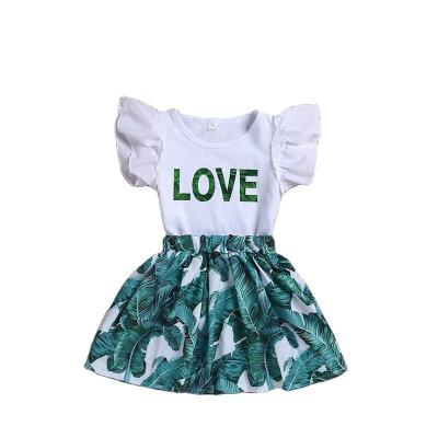 China Summer European and American fashion baby girl clothes 2-6T baby ChengXi style small flight sleeves two-piece letter printing shirt banana leaf skirt for sale