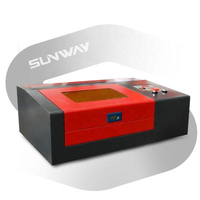 China Hot Sales Sunway 300*200mm Water Cooled Laser Engraving Machine for Engraving Stamp, Glass, Wood, Stamp for sale