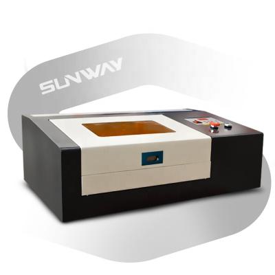 China Water Cooled Small Laser Engraving Machine 50W 3020 300x200mm Laser Engraver For Wood /Glass/ MDF Stamp for sale