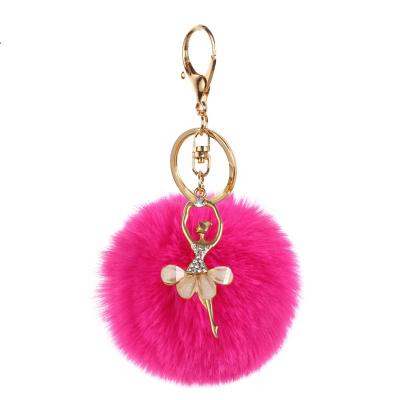 China Cute Fashion Plush Ball Keychain Dancing Angel Keychain Pendant Women Key Ring Holder Pompoms Key Bag for sale