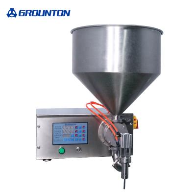 China Semi Automatic Servo Motor Servo Motor Food GROUNTON Auger Dry Powder Quantitative Packing Filling Packing Machine With Factory Price for sale