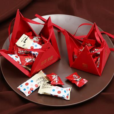 China Handmade Red Triangular Candy Box Wedding Gifts For Guests Wedding Decoration for sale