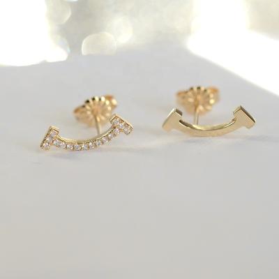 China Luxury 18K Gold Females Concise Style Fashionable Natural Arc Diamond Diamond Stud Earrings for sale