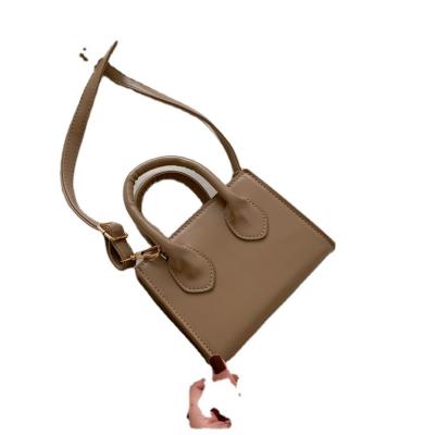 China Luxury Waterproof Handle Mini Bag Brand Purses 2021 Small Women Mini Cellphone Crossbody Handbags Kids Handbag Leather for sale