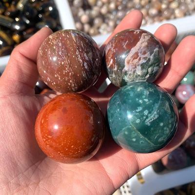 China Wholesale Bulk Natural China Crystal Ball Polished Rainbow Ocean Jasper Crystal Sphere For Decoration for sale