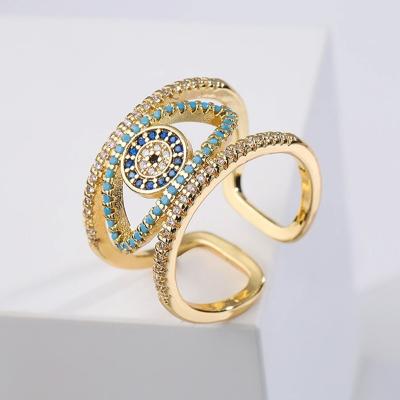 China Hollow Out Cute Trendy Turkish Blue Cubic Zircon Eye Ring Women Gold Color Plated Jewelry For Girl Party Gift for sale