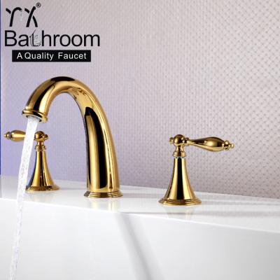 China Metered Faucets Double Handles Brass Basin Gold Bathroom Faucet 3 Holes for sale