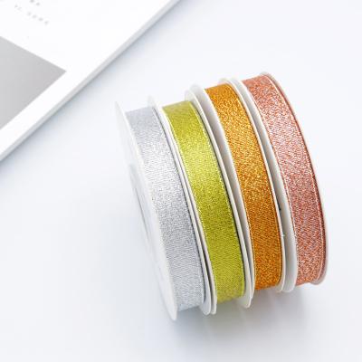 China Popular Boutique Wholesale Luster Polyester Glitter Ribbon High Tenacity Luminous Ribbon Factory for sale