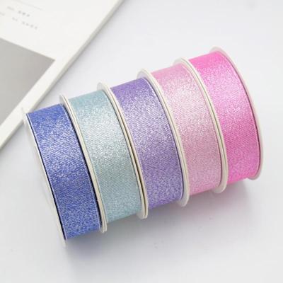 China Wholesale High Tenacity 1inch Christmas Gift Ribbon Wrapping Metallic Glitter Ribbon for sale