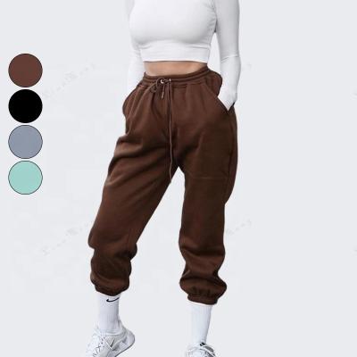 China 2022 European American Women's Fashion Solid Color Pants Summer Casual Strappy Sports Trousers AE148 for sale