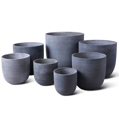 China Charming Handmade Ceramic GRC Planter Pots Round Shape Weather Resistant Drainage Hole Easy to Clean for sale