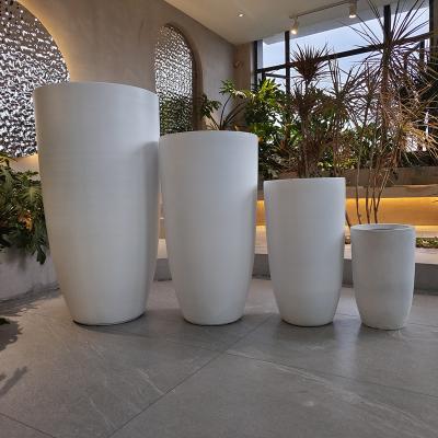 China Smooth Surface Fiber Clay Flower POTS For Flowers And Green Plant Decoration for sale