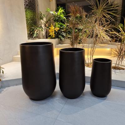 China Round Fiber Clay Flower Planters Pots Life Time Keep 5-6 Years Outdoor for sale