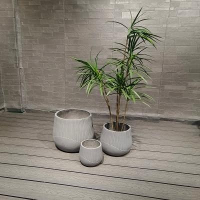 China Durable White Fiber Clay Planter with Drainage Holes for sale