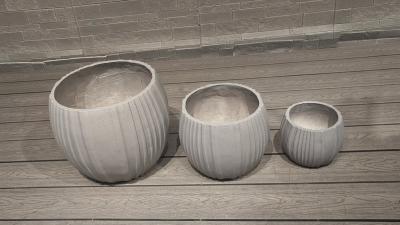 China Modern Round Hand Carved Decor Planters for Indoor Outdoor Hotel Decoration for sale