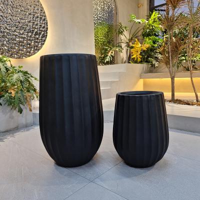 Κίνα Upgrade Your Gardening Game with Our Stylish Fiber Clay Planter Collection προς πώληση