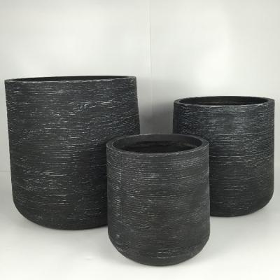 China Modern and Versatile Fiber Clay Planter Ideal for Both Indoor and Outdoor Plant Display for sale