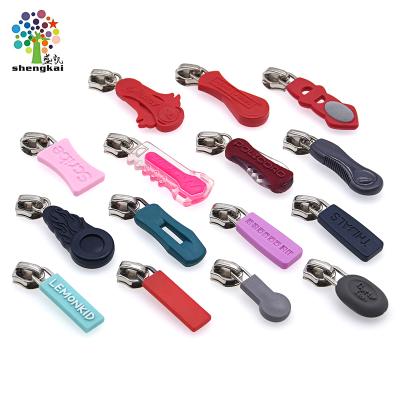 China Eco-firendly new hot sale design logos patches PVC zipper pull rubber zipper puller for clothing for sale