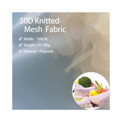 China 100% Sustainable Recycled Polyester RPET For Fruit Vegetable Bags 50D White Knitted Mesh Fabric Polyester Three Lines Flat Fabric for sale