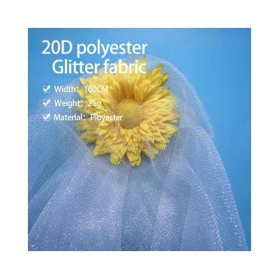 China Soft Ivory Mesh Textile Mesh Fabric Nylon Glitter Tulle Flame Retardant Popular Beautiful Fabric Wedding for sale