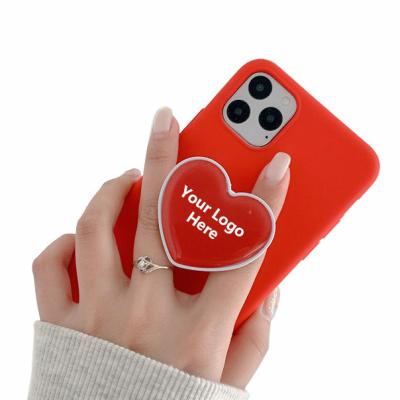 China Cheap factory price custom heart shape epoxy resin phone griptok adjustable for promotion gifts for sale