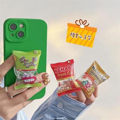 China Adjustable Accesorios Para Candy 3D Shape Cell Phone Griptok Celular Socket Holder for sale