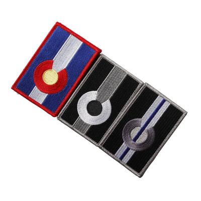 China Custom 3D Fabric Iron On Logo Flag Design Embroidered Embroidery Patches for sale