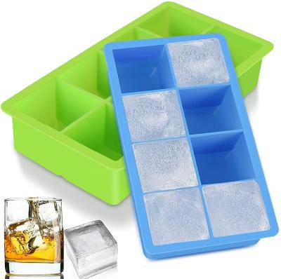 China Large Viable Silicone Ice Cube Trays 8 Square Cubes Tray Ideal for Whiskey Cocktails Soups Frozen Baby Food Treats with Covers for sale