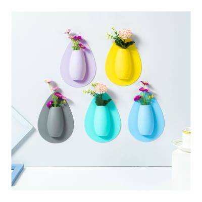 China Multicolor WALL Water Drop Shaped Strong Sticky Self Adhesive Flower Silicone Hanging Magic Vase for sale