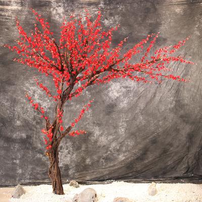 China Original natural touch shopping mall background decoration simulation plum tree floor display ornaments for sale